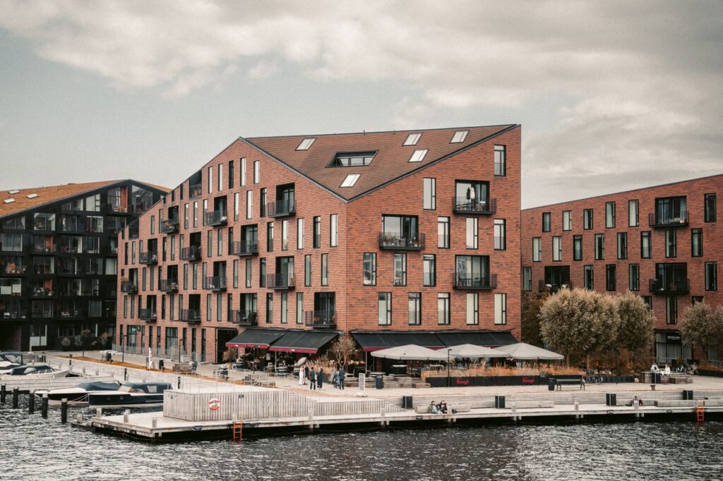 Scenic view of modern brick architecture by the waterfront in Copenhagen, Denmark.